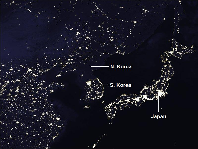 south korea and north korea at night. over in South Korea.